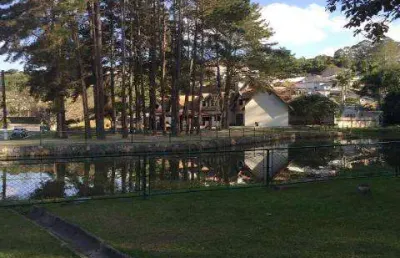 Venda casa em estilo normando condomínio arujá hills i ii com a/t 1838,23m², a/c 817,42m² e pavimento térreo 408,71m². consulte-nos.