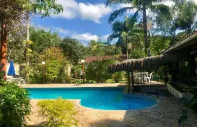 Venda de chácara no jardim são fernando, em itanhaém/sp, 2 terrenos com casa principal de 4 suítes, casa do caseiro, piscina e canil. consulte-nos.