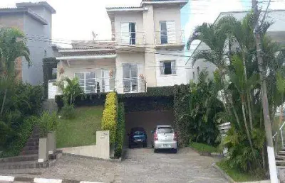 Venda de casa no condomínio hills iii, em arujá/sp, 255m² com 2 suítes, sala com lareira, cozinha c/ planejados, churrasqueira e 4 vagas. consulte-nos