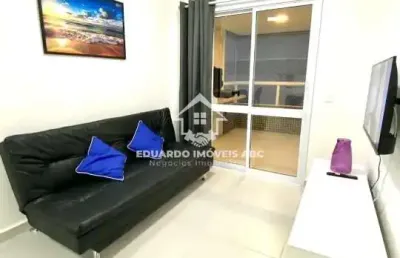 Ref 8510- 2 dormitórios. varanda. ótima localização- guilhermina- praia grande