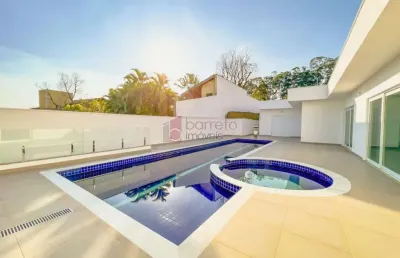 Casa térrea com 4 suítes à venda no condomínio estância marambaia em vinhedo/sp