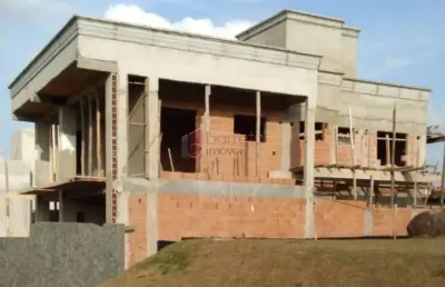 Terreno com construção à venda no condomínio brisas da mata em jundiaí/sp
