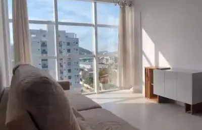 Apartamento semi mobiliado com dois dormitórios sendo uma suíte