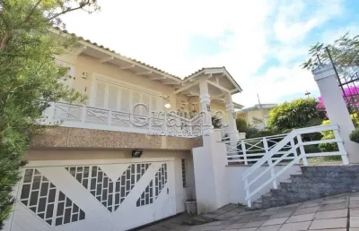 Casa com 5 quartos à venda na indianópolis, 240, três figueiras, porto alegre por r$ 2.000.000