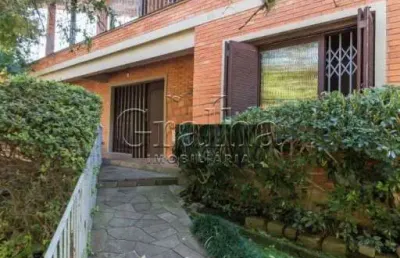 Casa com 4 quartos à venda na rua fonseca guimarães, 34, medianeira, porto alegre por r$ 1.500.000