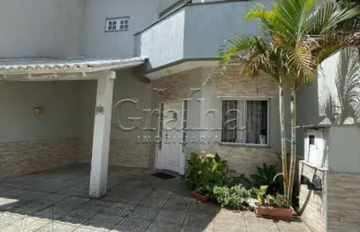 Casa em condomínio fechado com 3 quartos à venda na rua deputado hugo mardini, 1780, passo das pedras, porto alegre por r$ 699.000