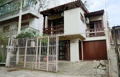 Casa com 3 quartos à venda na rua chile, 545, jardim botânico, porto alegre por r$ 999.000