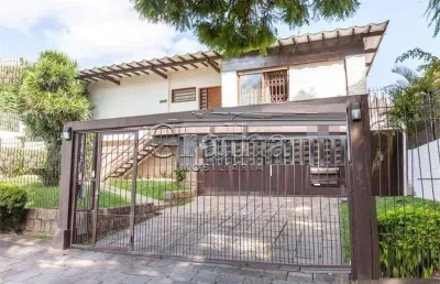 Casa com 4 quartos à venda na rua joão paetzel, 821, chácara das pedras, porto alegre por r$ 1.490.000