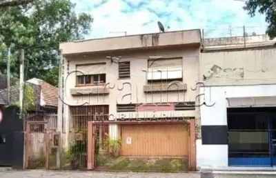 Casa com 5 quartos à venda na rua santa cecília, 1738, santa cecília, porto alegre por r$ 900.000