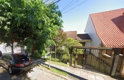 Casa com 4 quartos à venda na rua alcebíades antônio dos santos, 513, nonoai, porto alegre por r$ 980.000