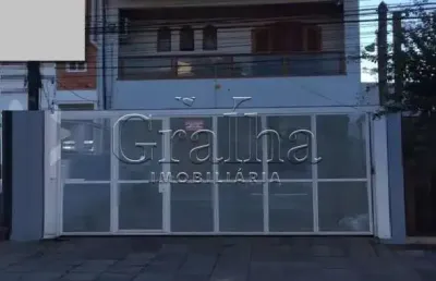 Casa com 3 quartos à venda na rua veríssimo rosa, 102, partenon, porto alegre por r$ 980.000