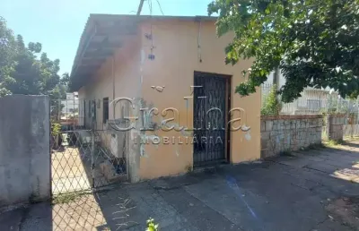 Casa com 6 quartos à venda na rua teixeira de freitas, 219, santo antônio, porto alegre por r$ 330.000
