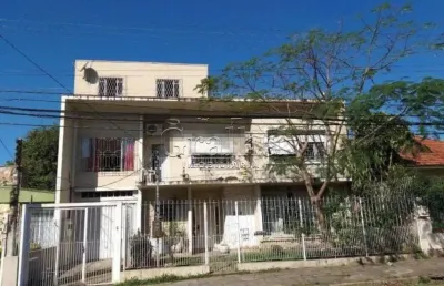 Casa com 5 quartos à venda na rua doutor voltaire pires, 210, santo antônio, porto alegre por r$ 795.000