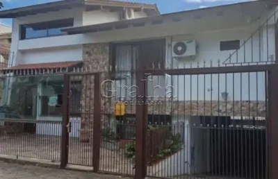 Casa com 4 quartos à venda na rua professor ulisses cabral, 64, chácara das pedras, porto alegre por r$ 1.930.000