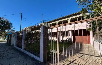 Casa com 3 quartos à venda na rua monteiro lobato, 323, partenon, porto alegre por r$ 680.000