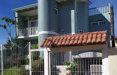 Casa com 3 quartos à venda na rua graciano azambuja, 341, partenon, porto alegre por r$ 1.150.000