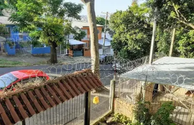 Casa com 4 quartos à venda na rua pedro velho, 264, partenon, porto alegre por r$ 400.000