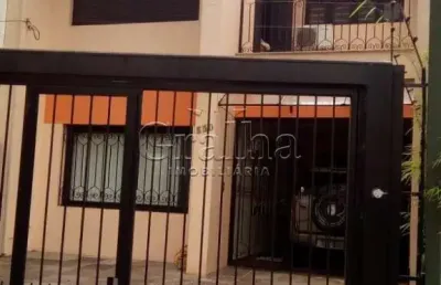 Casa com 3 quartos à venda na avenida lavras, 530, petrópolis, porto alegre por r$ 1.200.000