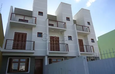 Casa com 2 quartos à venda na rua hugo nelson magalhães, 139, parque santa fé, porto alegre por r$ 499.000