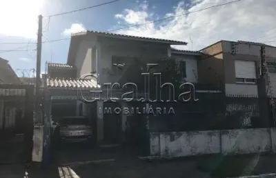 Casa com 5 quartos à venda na rua coronel jaime da costa pereira, 318, partenon, porto alegre por r$ 950.000