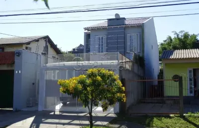 Casa em condomínio fechado com 5 quartos à venda na rua banco inglês, 307, santa tereza, porto alegre por r$ 690.000