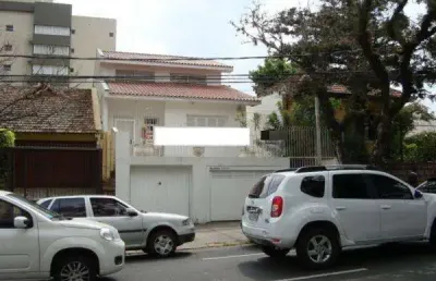 Casa com 4 quartos à venda na rua américo vespucio, 374, higienópolis, porto alegre por r$ 1.500.000