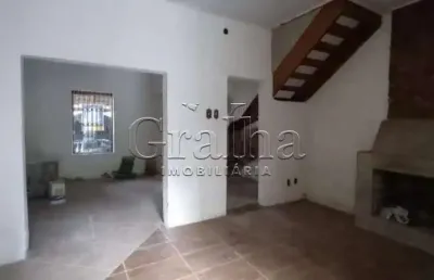 Casa com 4 quartos à venda na rua santo antônio, 82, floresta, porto alegre por r$ 490.000