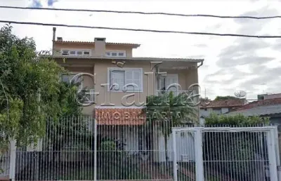 Casa com 4 quartos à venda na rua pedro pereira de souza, 117, partenon, porto alegre por r$ 1.064.000