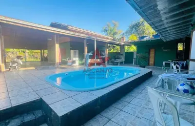 Casa a venda na praia do estaleiro proximo ao mar com edicula nos fundos