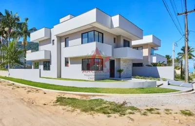 Casa a venda em condominio fechado na praia da lagoinha com 04 suites