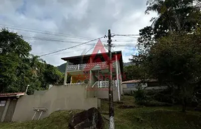 Casa a venda em condominio e mais um terreno com 518m² ao lado