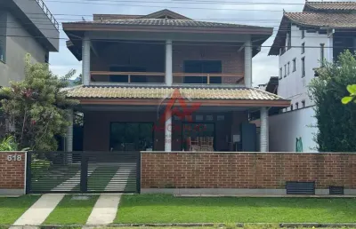 Casa a venda em condominio fechado na praia da lagoinha com 04 suites de frente para o mar