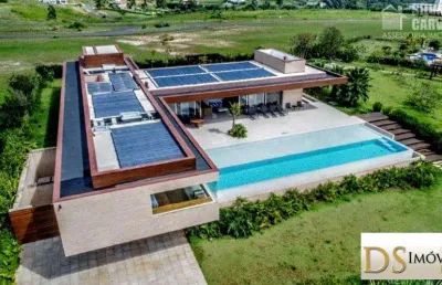 Luxuosa casa à venda no condomínio terras de são josé ii em itu/sp: 4 suítes, 3 salas, 841m² de pura sofisticação!