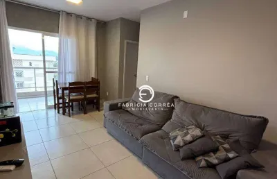 Apartamento com varanda ampla, planejados e 2 dormitórios