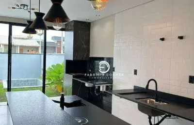 Casa moderna com piscina aquecida, área gourmet e suíte com closet