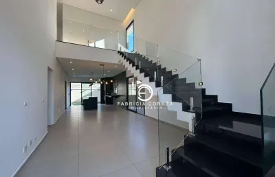 Casa sofisticada com 4 suítes, piscina e acabamentos de alto padrão