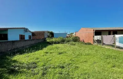 T124 terreno no centro de mariluz em região de moradores