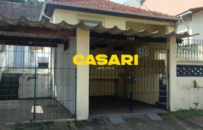 Terreno com duas casas para investimento à venda na vila scarpelli – santo andré/sp