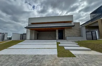 Casa térrea com área gourmet e piscina – colinas do paratehy – 3 suítes
