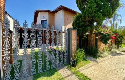 Condomínio colinas sobrado com 316m2 com area gourmet + edicula - avalia troca com apartamento