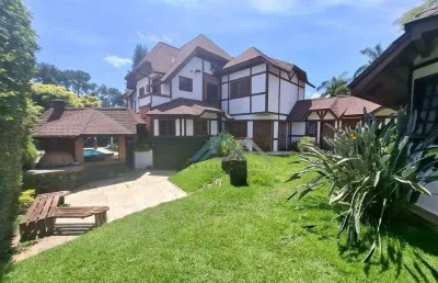 Espetacular casa de alto padrão com 4 suítes para alugar, 420 m² por r$ 15.500/mês - residencial tres (alphaville) - santana de parnaíba/sp