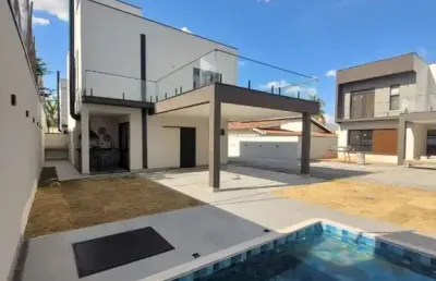 Sobrado novo em condomínio próximo a al lucas nogueira garcez.  são 3 suítes piscina área gourmet