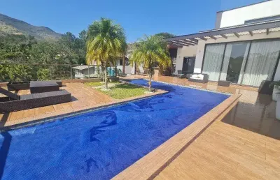 Luxuosa casa em condomínio flamboyant: 4 suítes, 5 salas, 8 banheiros, 8 vagas, 720m² - atibaia-sp.