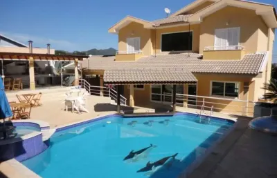 Casa no condomínio porto atibaia segurança e lazer com 5 suítes, piscina, área gourmet.