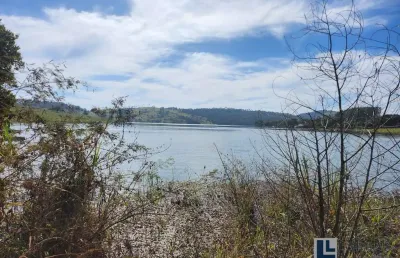 Excelente lote para venda em cássia / delfinopolis no condominio praias do lajeado, área 1.005 m2,  com 23,5 m beira da represa