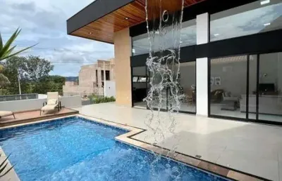 Maravilhosa casa alto padrão para venda no condominio morada da fronteira em rifaina-sp, 4 suites, gourmet e piscina em 220 m2 construidos