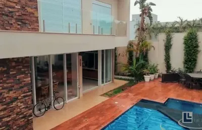 Maravilhoso sobrado altíssimo padrão para venda no charmoso alphaville 2 em bonfim paulista, 5 suites, gourmet e piscina em 414 m2 construidos