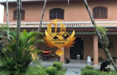 Imperdível oportunidade de adquirir casa ampla de 5 quartos no centro de tremembé-sp, com suíte, salas, banheiros, garagem e 414m²!