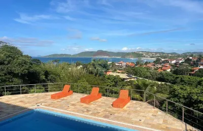 Exclusividade em geribá: casa de alto padrão com vista mar e estrutura completa para aluguel anual