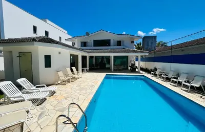 Linda casa de 4 suítes pronta para morar em guarujá